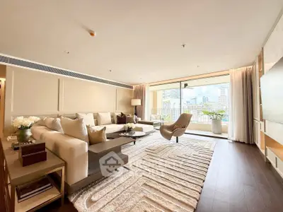 Luxurious living room with modern decor and city view balcony