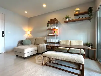 Modern living room with cozy beige sofa and stylish wooden furniture