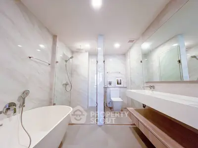 Luxurious modern bathroom with elegant fixtures and spacious design