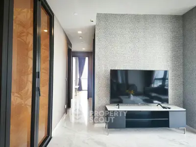Modern living room with sleek TV setup and elegant decor