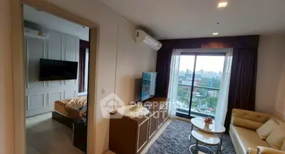Modern living room with city view and cozy bedroom in a stylish apartment