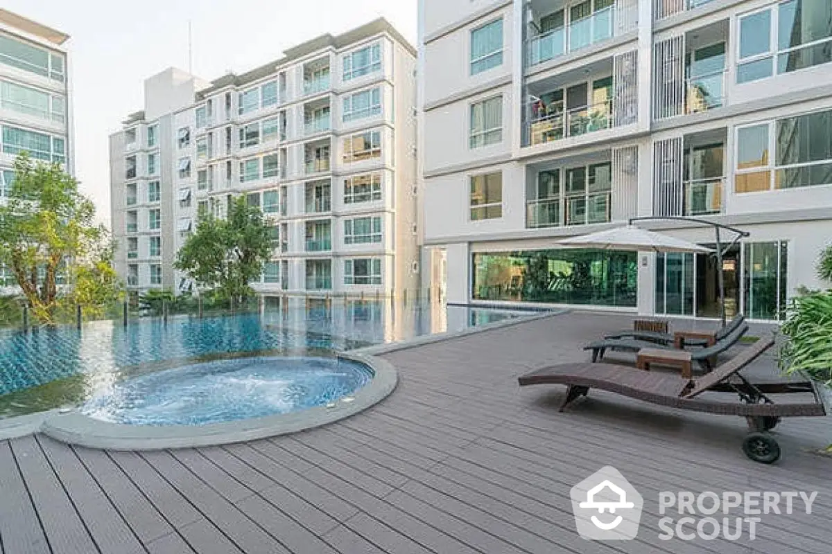 Luxurious condominium with pool and sun deck in serene setting