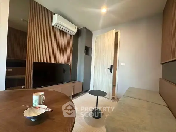 Modern living room with air conditioning and stylish decor