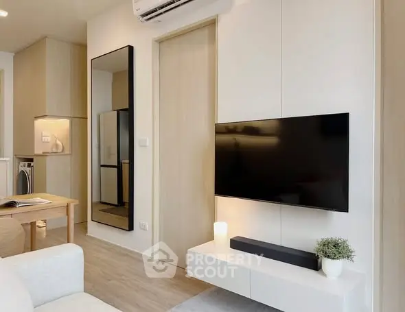 Modern living room with sleek TV setup and stylish decor