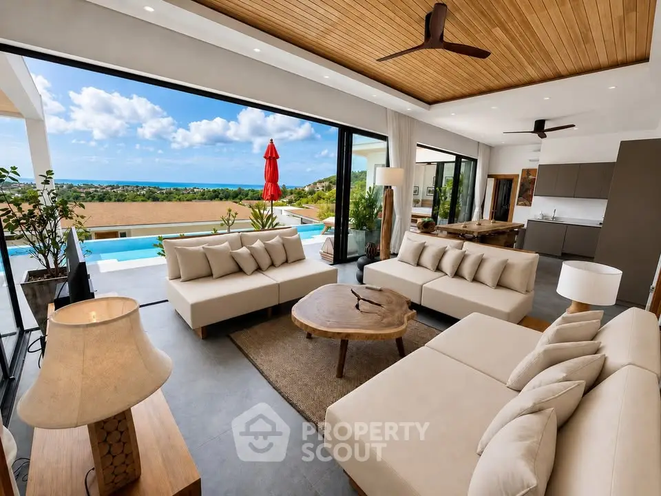Luxurious open-plan living room with stunning ocean view and modern decor