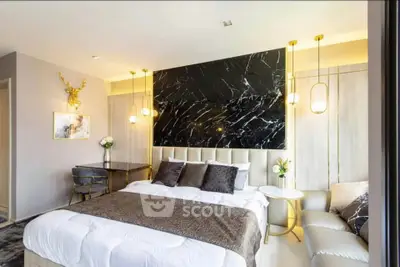 Luxurious bedroom with elegant decor and modern lighting