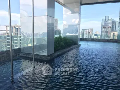 Luxurious rooftop infinity pool with stunning city skyline views