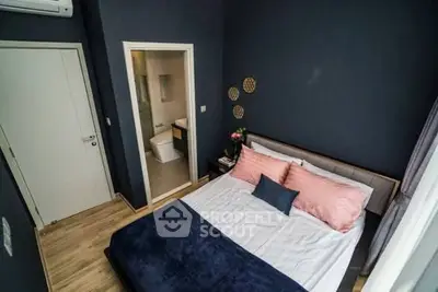 Cozy bedroom with ensuite bathroom and stylish decor