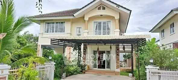 Charming two-story house with lush garden and spacious driveway in serene neighborhood.