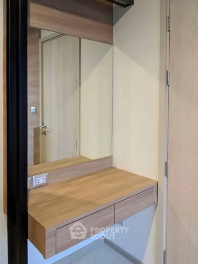 Modern minimalist wooden vanity with mirror in compact space