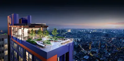 Stunning rooftop view of modern high-rise building with lush garden overlooking cityscape at dusk.