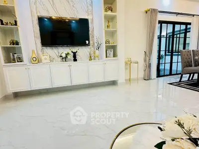 Elegant living room with marble flooring and modern decor