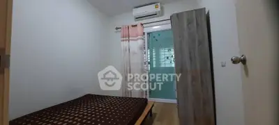 Cozy bedroom with air conditioning and modern decor