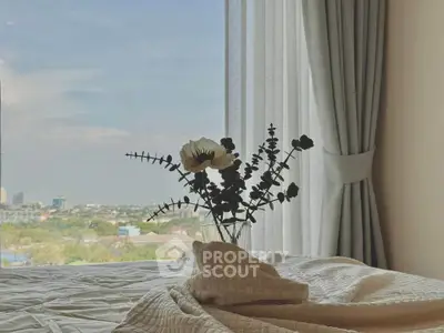 Luxurious bedroom with stunning city view and elegant decor