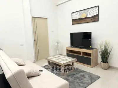 Modern living room with stylish decor and cozy seating area