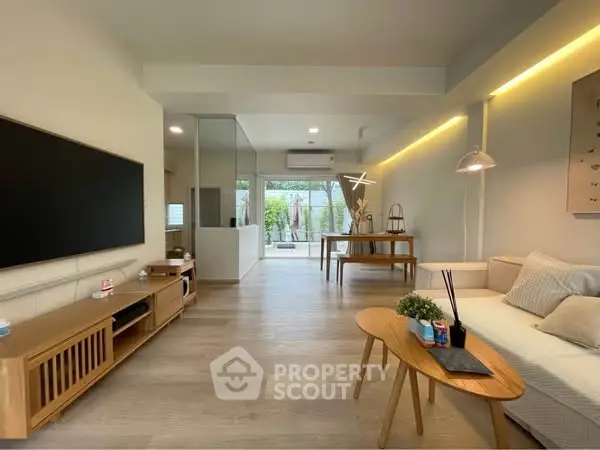 Spacious modern living room with stylish furniture and natural light