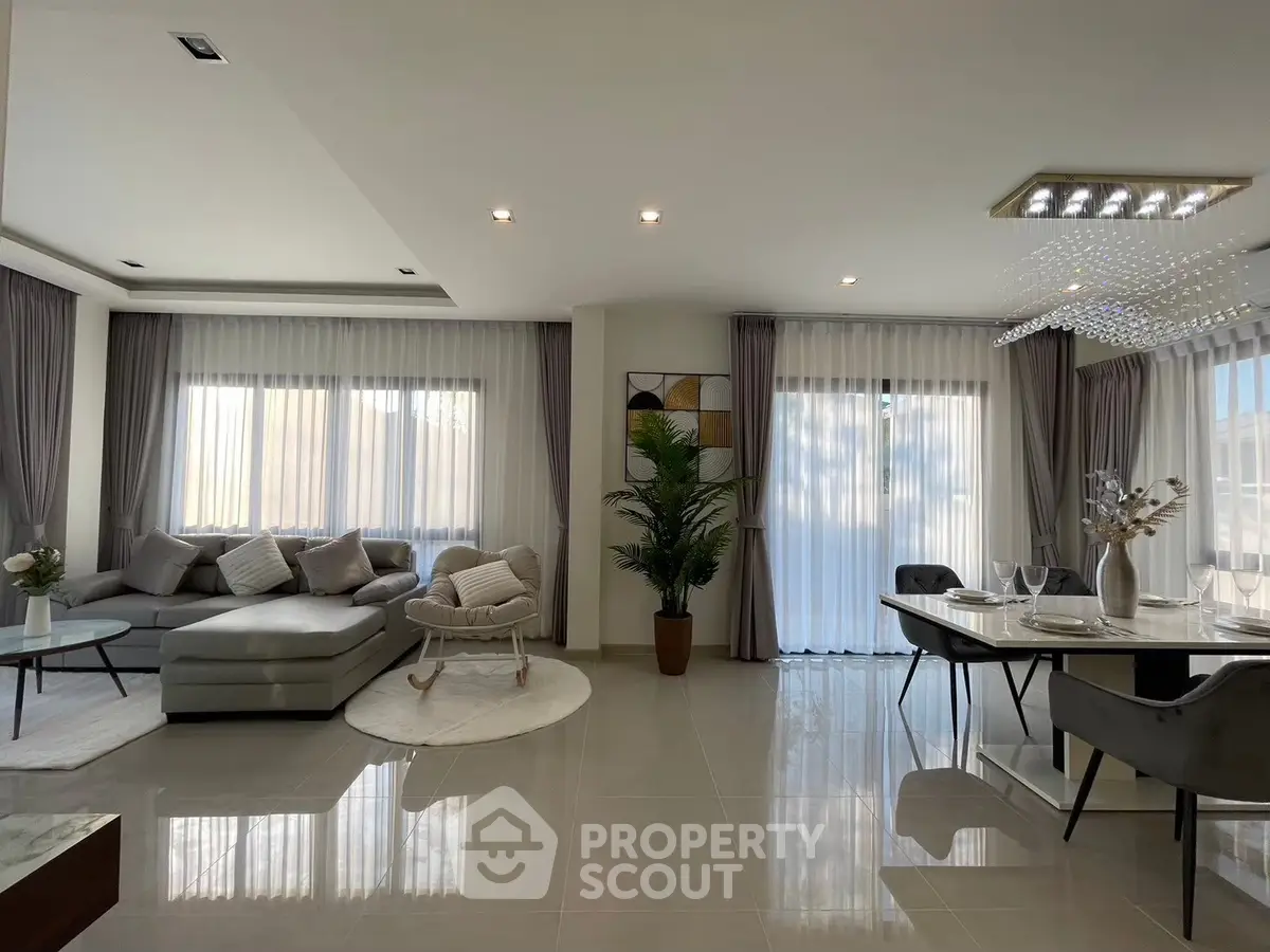 Luxurious modern living room with elegant decor and natural light