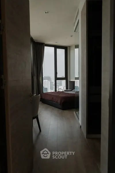 Modern bedroom with city view and sleek design