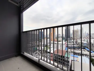 Stunning cityscape view from a modern high-rise balcony, perfect for urban living.