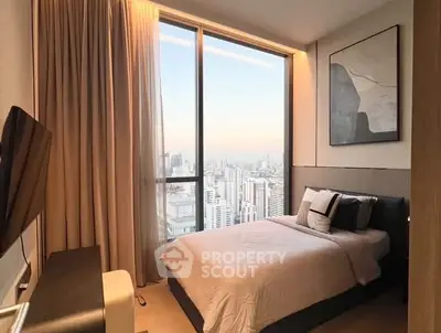 Luxurious bedroom with stunning city view and modern decor