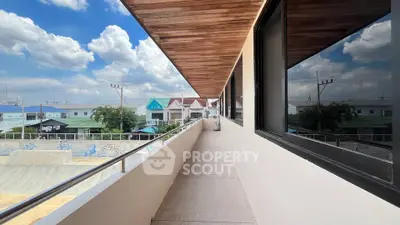 Spacious balcony with modern design and scenic neighborhood view