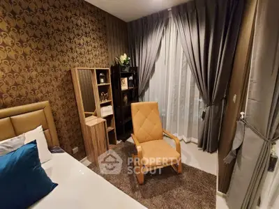 Cozy bedroom with elegant decor and comfortable seating