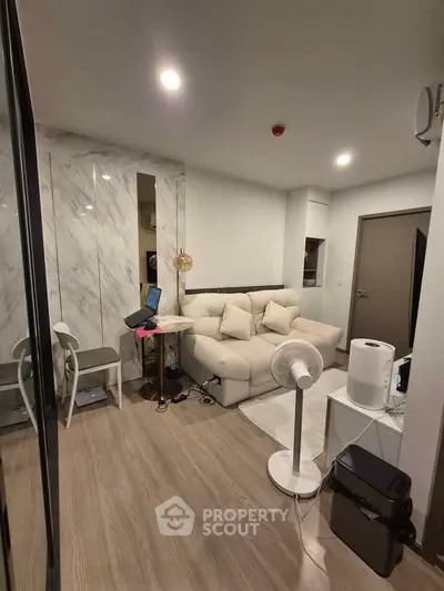 Modern living room with stylish decor and cozy seating area