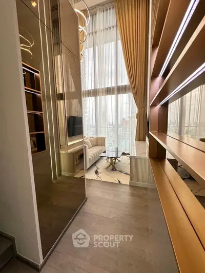 Luxurious high-ceiling living room with modern decor and floor-to-ceiling windows offering stunning city views.