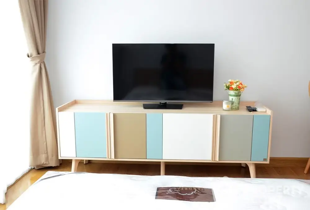 Modern living room with stylish TV stand and flat-screen TV