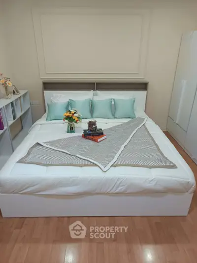 Cozy bedroom with elegant decor and stylish bedding, perfect for relaxation and comfort.