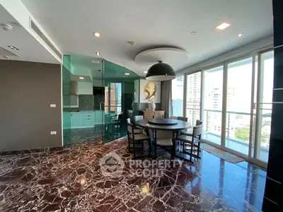 Luxurious dining area with marble flooring and city view in modern apartment