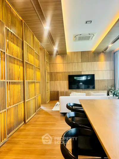 Modern living room with wooden accents and stylish furniture