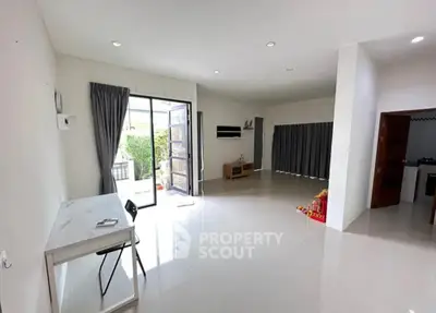 Spacious modern living room with open layout and natural light