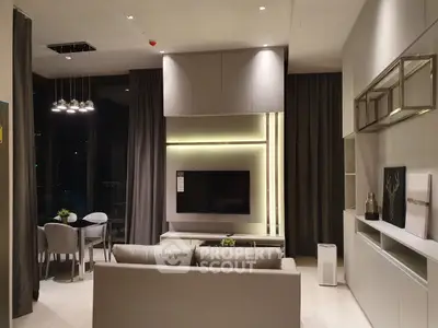 Modern living room with sleek furniture and ambient lighting