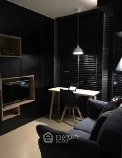 Cozy modern study room with sleek black walls and stylish furniture