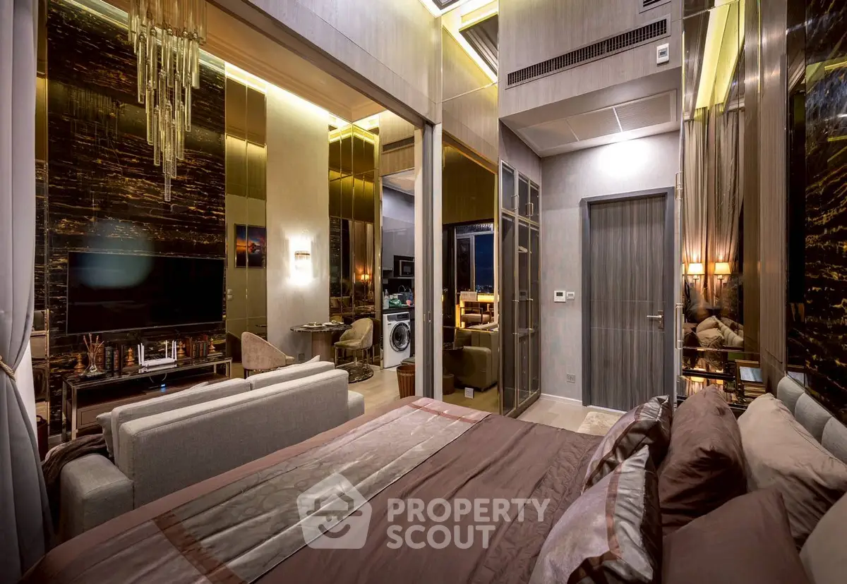 Luxurious modern bedroom with elegant decor and open living area in a high-end apartment.