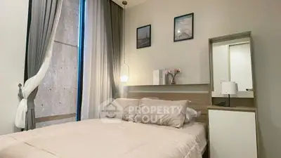 Cozy modern bedroom with elegant decor and natural light