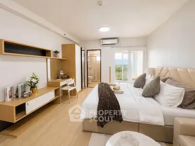 Spacious modern bedroom with elegant decor and scenic view