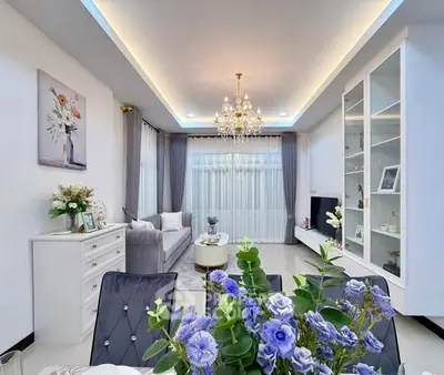 Elegant living room with chandelier and modern decor