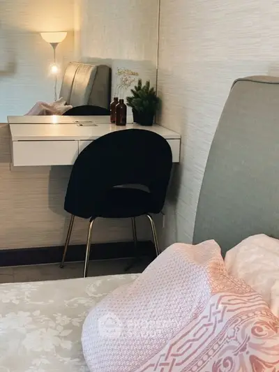 Cozy bedroom with stylish decor and elegant vanity setup