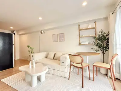 Stylish modern living room with cozy seating and elegant decor