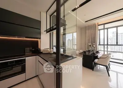 Modern kitchen with sleek design and open layout, featuring city view and dining area.