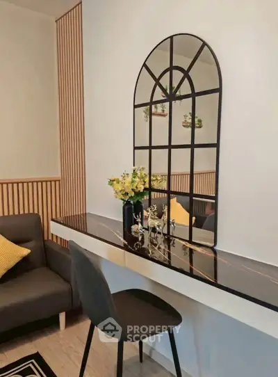 Stylish modern living room with elegant decor and sleek furniture, perfect for urban living.