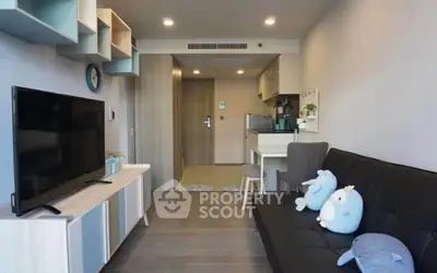 Modern living room with sleek furniture and stylish decor in a cozy apartment.