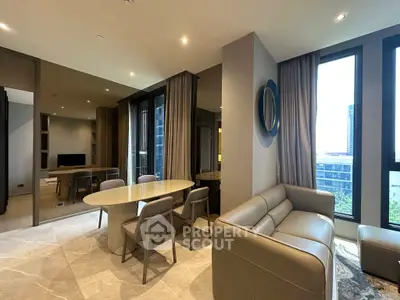 Luxurious modern living room with elegant furniture and large windows offering city views.
