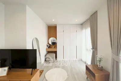 Modern living room with stylish furniture and natural light