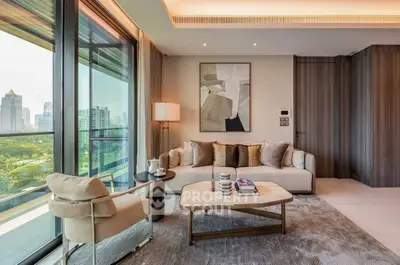 Luxurious living room with modern decor and stunning city view from large windows.