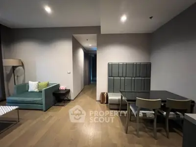 Modern living room with stylish furniture and wooden flooring
