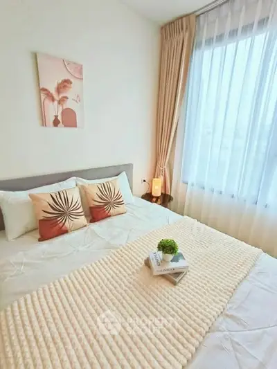 Cozy bedroom with elegant decor and natural light