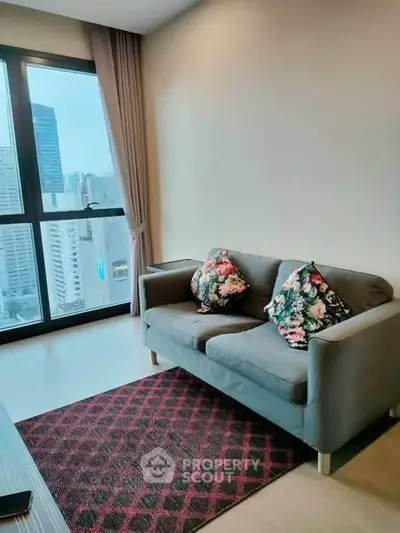 Modern living room with city view and stylish sofa